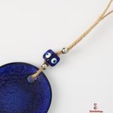 Elegant Blue Evil Eye Glass pendant – Guardian of Harmony