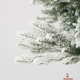 Snow-Covered White Christmas Tree